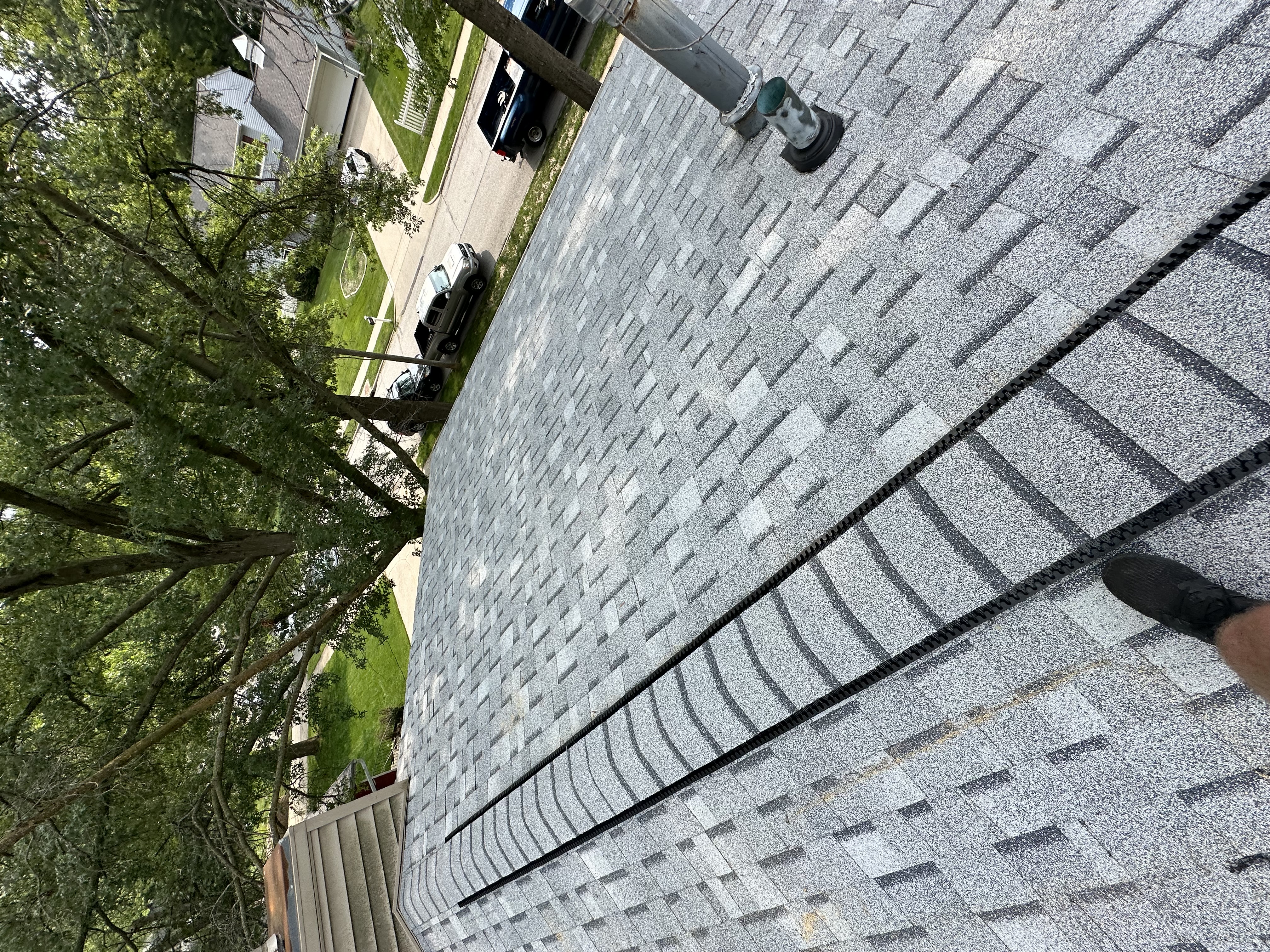 Grey Shingle Roof Installation